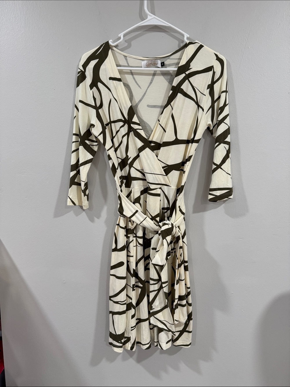 Ava Sky Fighting Eeel ivory and olive green abstract print 3/4 sleeve tie dress